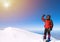 Lone male mountain climber on summit