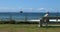 A lone man looks out over the ocean during the coronavirus quarantine