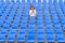 Lone middle-aged woman in a stadium