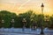 Lone passerby on Alexander III bridge at dawn