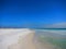 Lone person walking on a beach