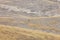 Lone rider on a horse in the mountain steppe