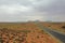 Lone road leading to Monument Valley in Arizona