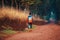 A lone runner trains in Kenya. A marathon runner runs on red soil in the city of Iten, home of Champions. Motivation to run,