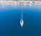 A lone sailboat at anchorage near the town of Marmaris in Turkey