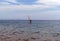 a lone sailboat, sliding on the smooth surface of the black sea in Arkhipo-Osipovka.