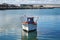 Lone seagull sitting on fisher boat