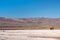 Lone shack on white beach of Salton Sea, CA, USA