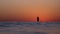 Lone Stand up Paddler on the Ocean at Sunset