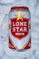 Lone Star Beer beer can on ice