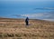 A lone walker on the boardwalk at Hermaness on the island of Unst in Shetland, Scotland, UK.