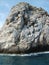 A lone white rock in the sea