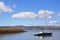 Lone Yacht moored off the banks of Dam