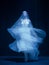 Loneliness. Young graceful beautiful woman, balerina in white wedding dress in art performance.