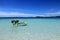 Lonely anchored boat in the tropical lagoon