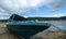 Lonely ancient boat on the Balinese coastline