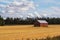 Lonely barn by the road in the Finland in fall