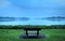 Lonely bench overlooking peaceful landscape