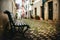 Lonely bench and quiet alley of Alfama district, Lisbon, Portugal