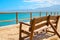 Lonely bench on a viewing platform with views of the sea and the