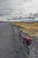 Lonely bike of a traveller on icelandic road, summer time