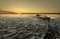 Lonely boat on frozen river