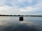 Lonely boat on lake, early morning