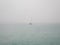 A lonely boat on a moody Mediterranean sea in Tuscany - 2