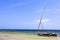 Lonely boat next to Mnemba atoll in Zanzibar Tanzania