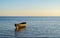 Lonely boat in the water - peaceful evening seaside