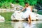 Lonely bride in a rock by the river