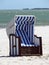 Lonely canopied beach chair 01