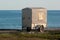 Lonely caravan trailer at a seaside