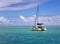 Lonely catamaran in a beautiful turquoise lagoon