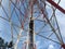 A lonely cellular network tower is seen against a clear blue sky. GPS, 3G, 4G, 5G signal receiver and transmitter.