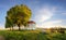 Lonely chapel in farm fields in spring day