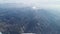 Lonely cloud floats over amazing mountain ranges in Turkey - top view - 14s