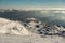 Lonely Cottage high in the Mountain in a snowy Winter Landscape