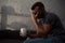 lonely crying man holding cup of coffee sitting