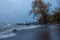 Lonely desolate beach at stormy weather