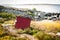 Lonely falun red barn at coast of sweden