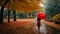 Lonely girl stands the autumn park, rain leaves october lifestyle