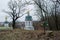 Lonely grave near ncient trinity christian ortodox church