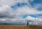 Lonely hiker with blue sky