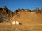 A lonely house at the foot of the mountains in Iceland. Incredible landscapes of nature. Life for a social phobia