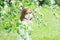 Lonely ill teenage girl wearing protection medicine mask against virus and allergy