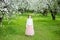 Lonely ill teenage girl wearing protection medicine mask against virus and allergy