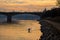 Lonely kayaker at sunset on the Danube river, Budapest