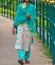 Lonely lady is walking in a street unique photograph