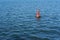 Lonely lighthouse buoy